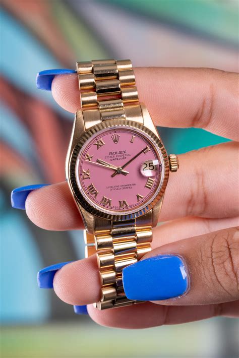 women's pink face Rolex